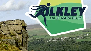 Ilkley Half Marathon with large rock and view of countryside