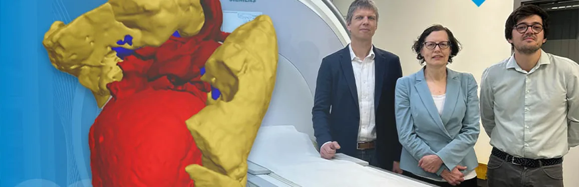 Photo in background: three doctors stand next to an MRI machine. 3D digital image of a heart in red and yellow in the foreground shows what can be seen when using VR glasses.