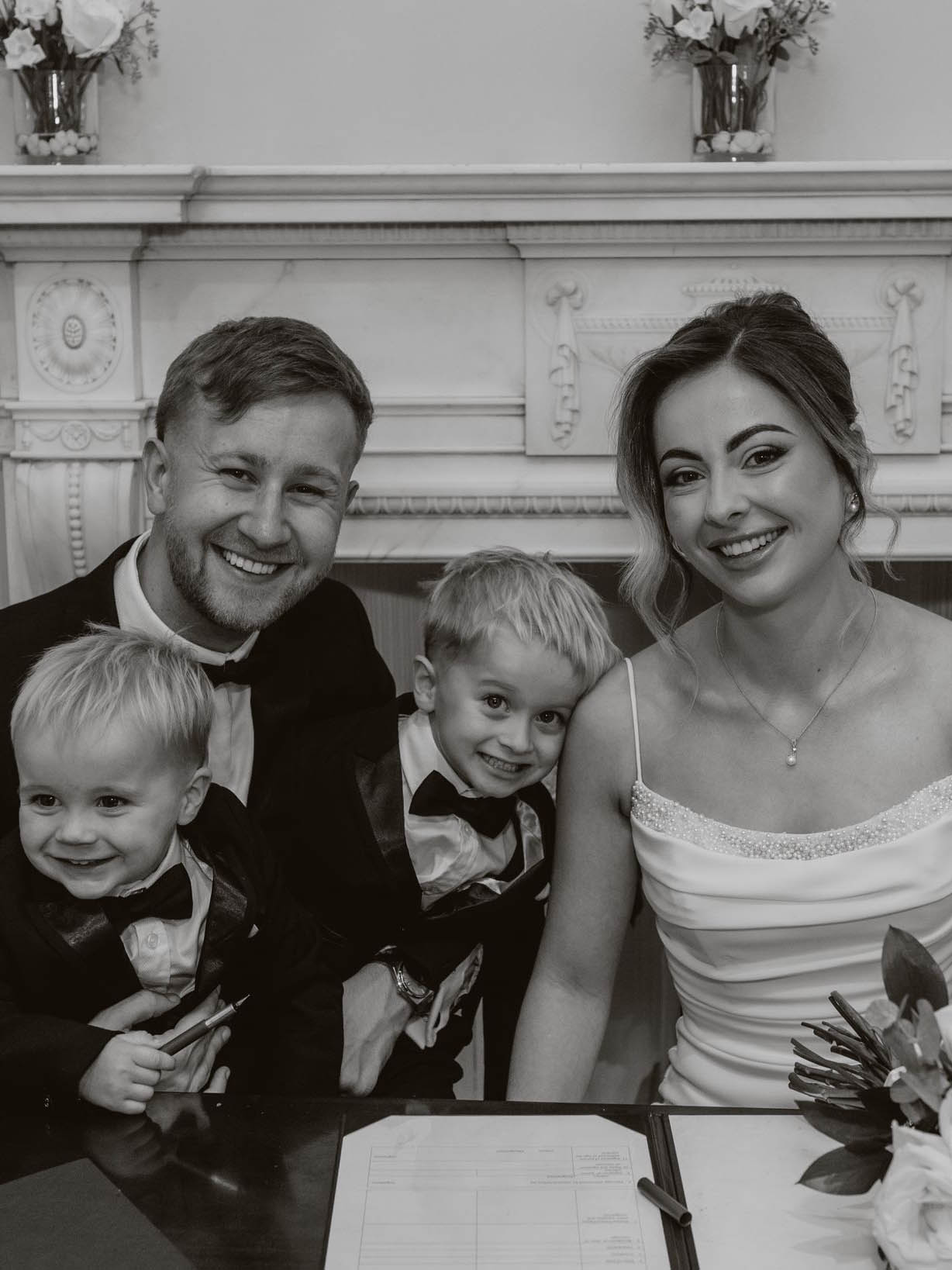 The Jackson Family after walking up Snowdon, all wearing matching Roxy tshirts and holding her cuddly toys