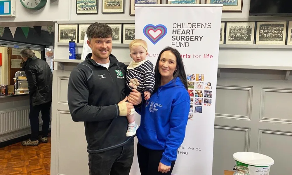 Family with child supporting charity event