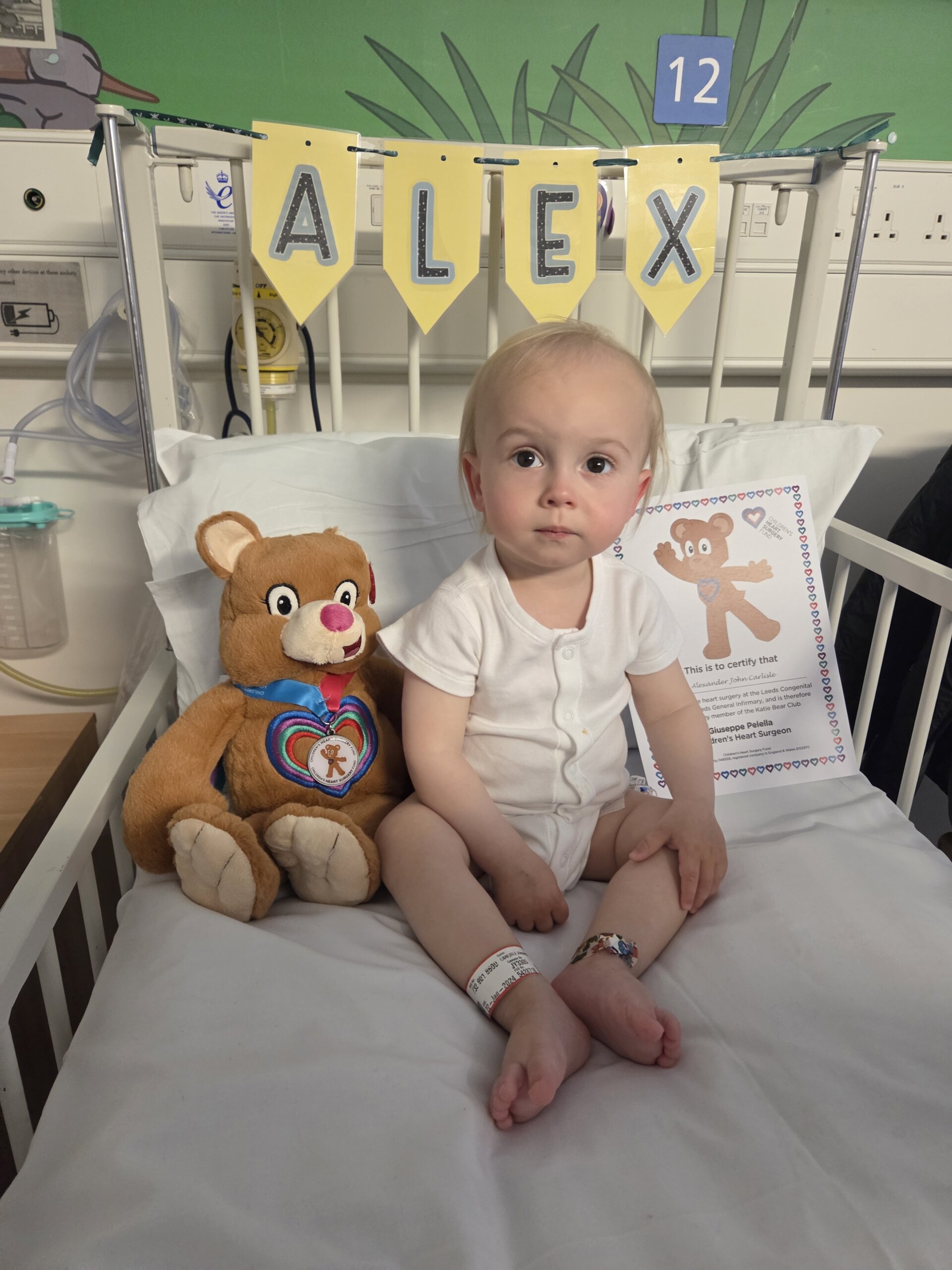 Alex with his Katie Bear after surgery.