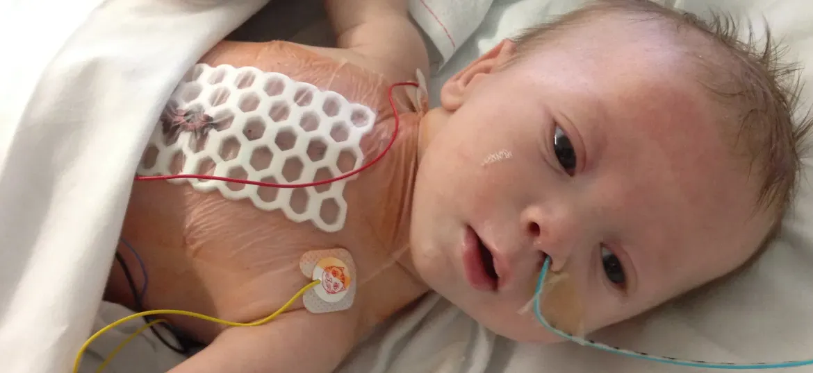 Ollie with his son Alex while in hospital, on Ward L51.