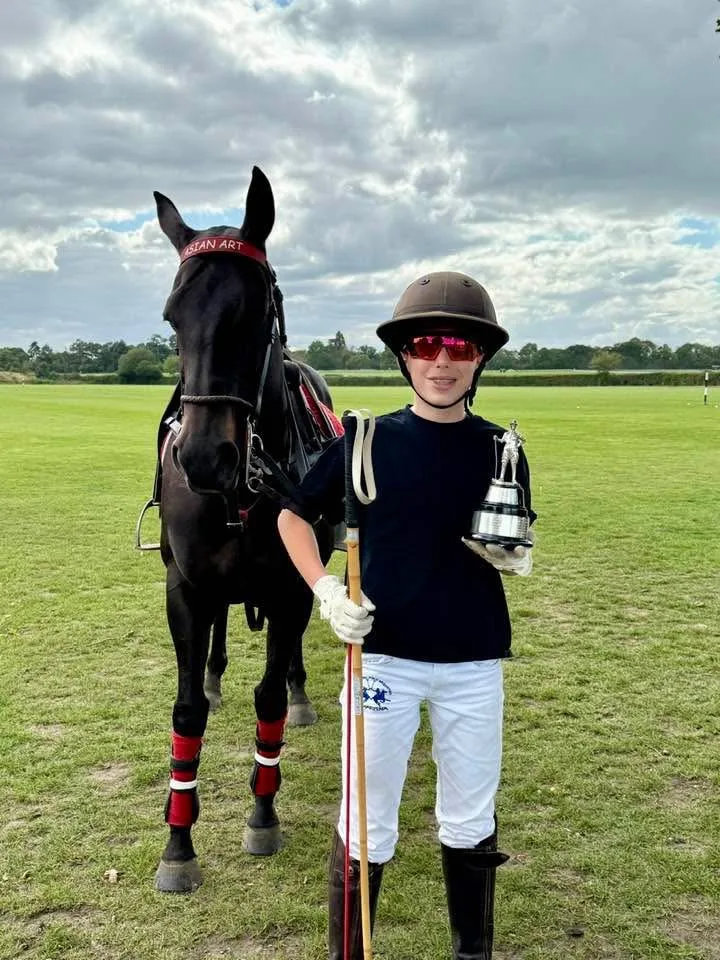 Frankie after a Polo match with a horse